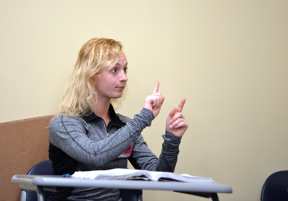 A Deaf Studies student in a classroom
